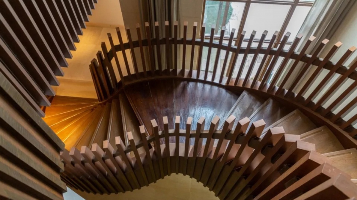 Wooden spiral staircase at Qiu Shan Ju