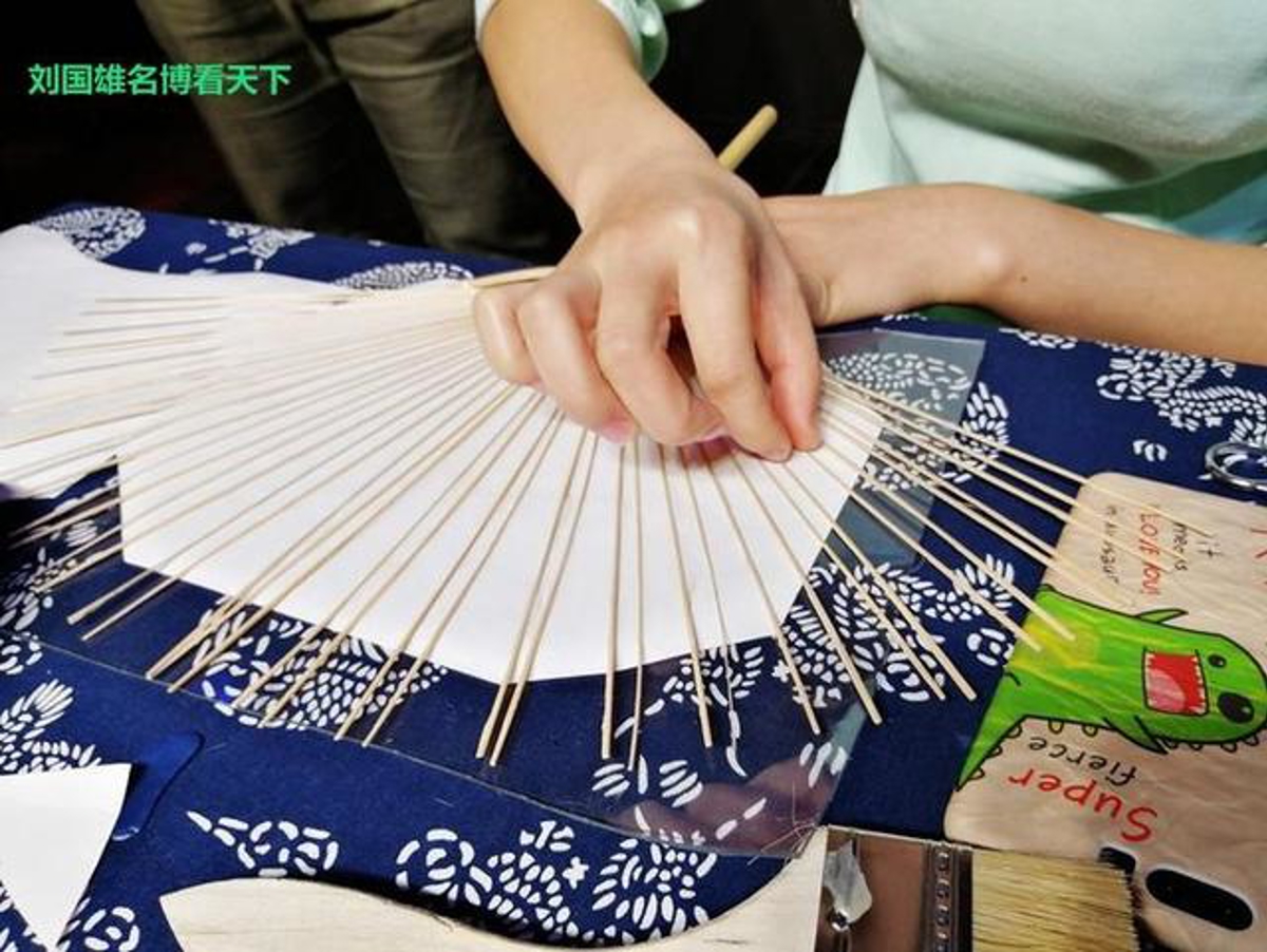 Instructor demonstrating glue application