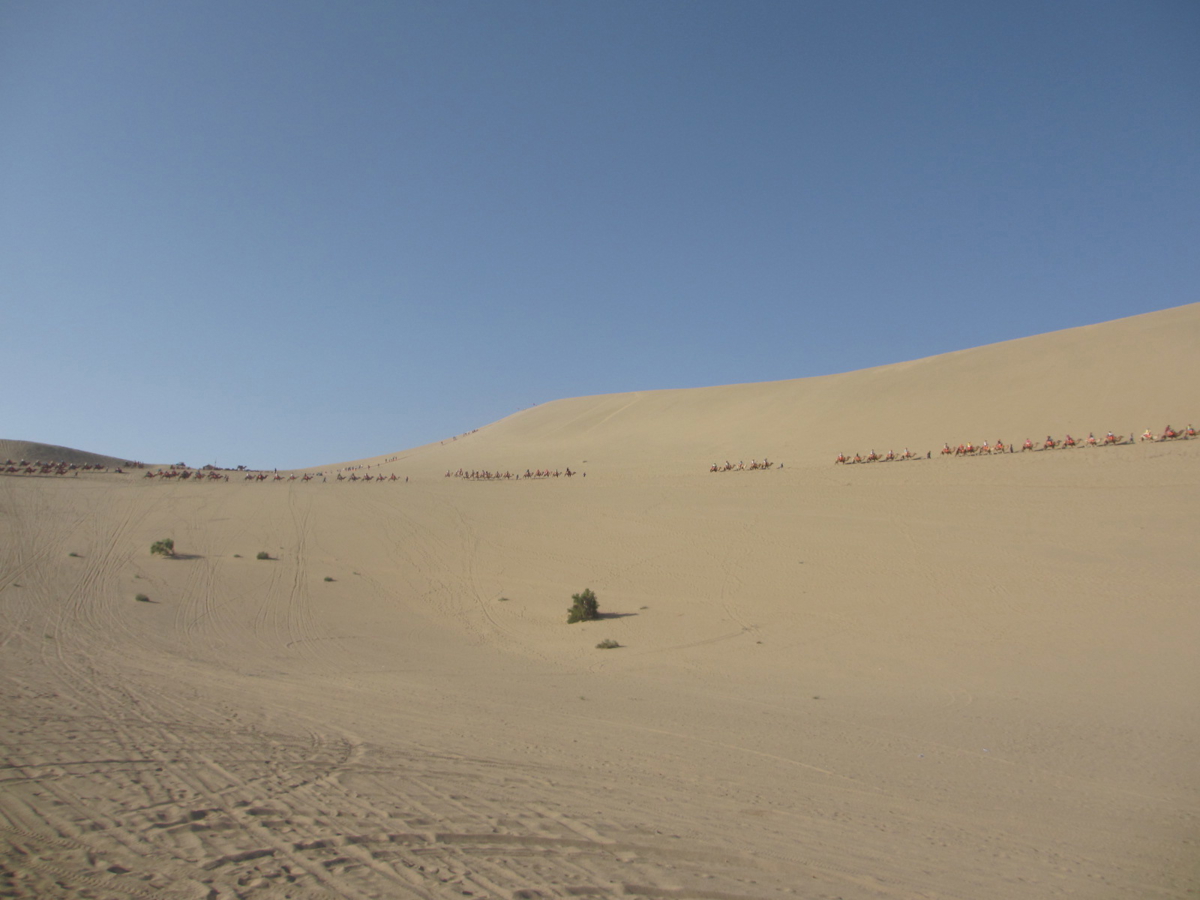 Rolling sand dunes at Mingsha Mountain