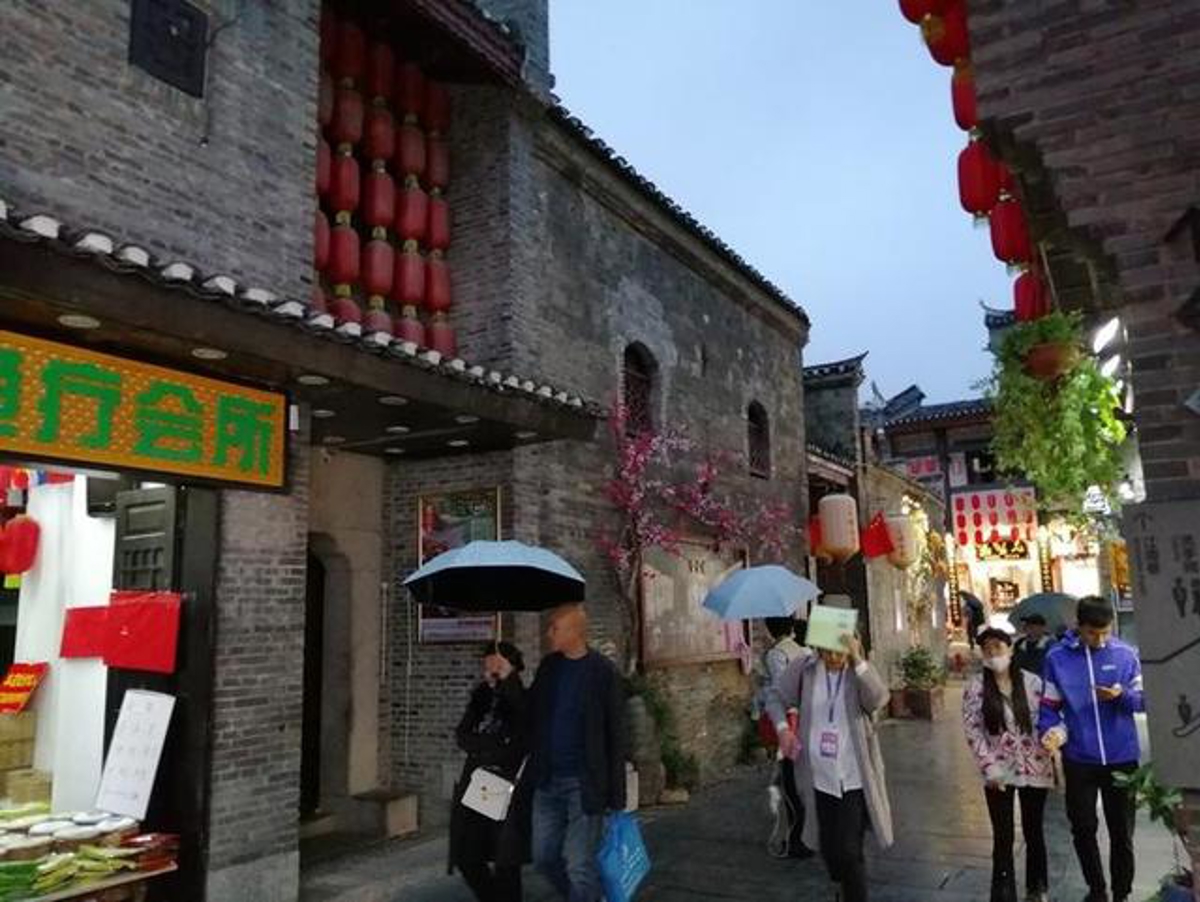 Instructor teaching fan making