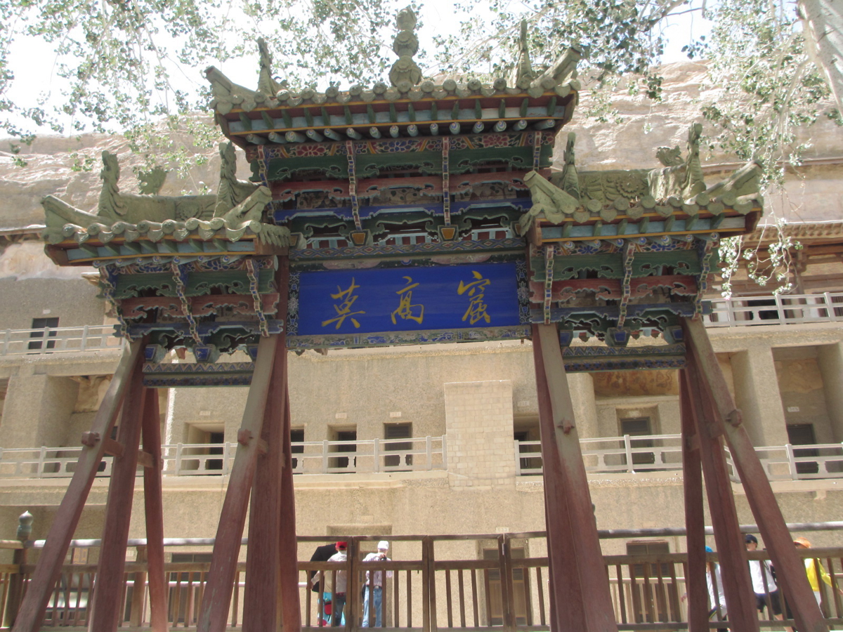 The cliff face with cave entrances