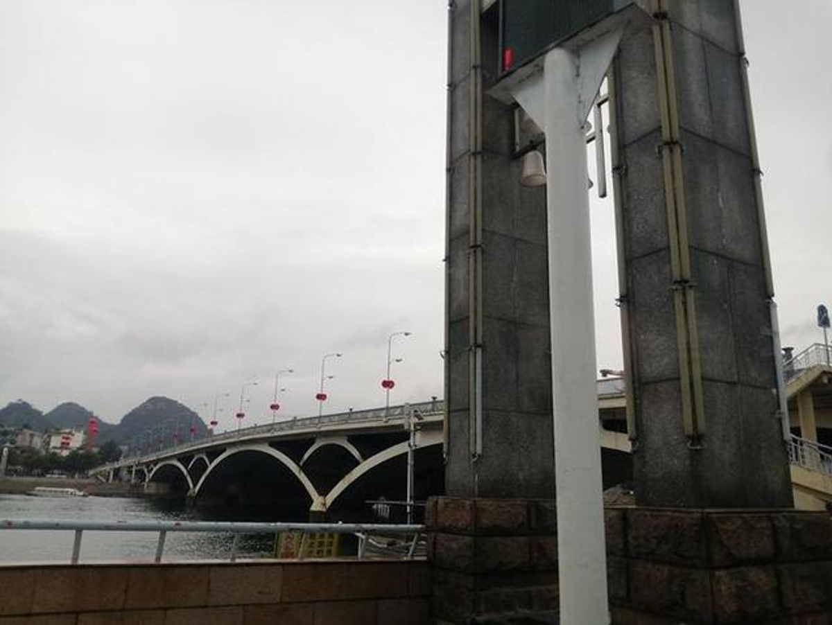 View of Liberation Bridge from car