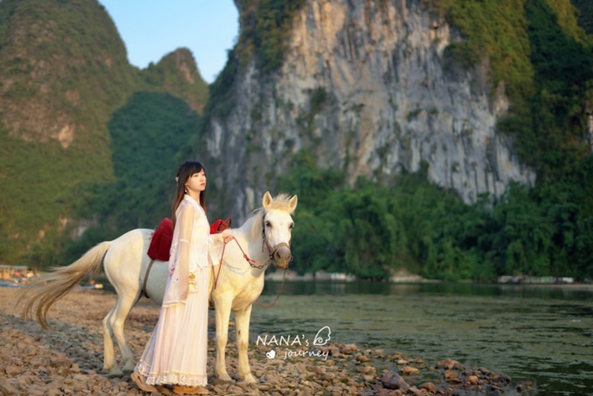 Horse riding along Li River